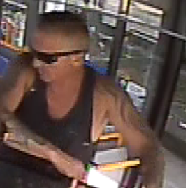 CCTV image of a man police wish to speak to regarding an incident involving a woman and children.