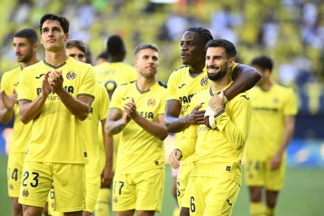 Villarreal soccer players celebrating.