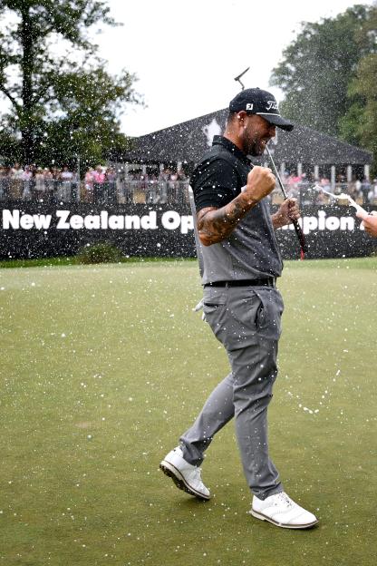 Golfer Ryan Peake celebrates winning the New Zealand Open.