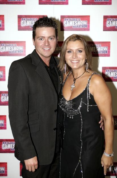 Tricia Penrose and her husband Mark Simpkin at a gameshow event.