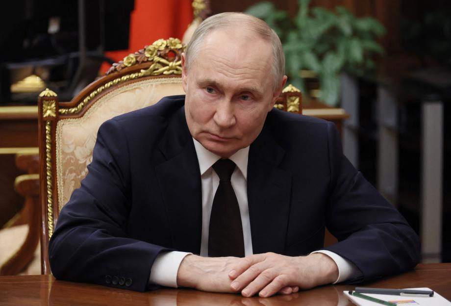 Vladimir Putin at a meeting.