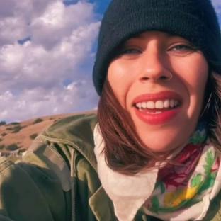 Fairuza Balk smiling outdoors.