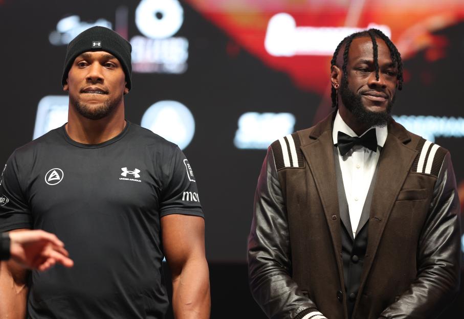 Anthony Joshua and Deontay Wilder at a press conference.