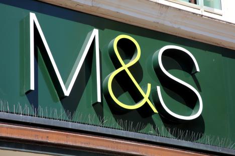 Marks & Spencer logo on a store sign.