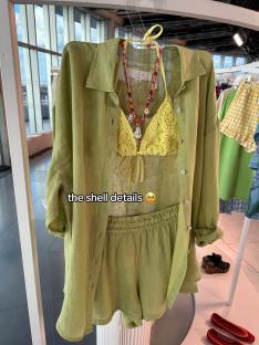 Lime green linen shirt, shorts, and crocheted bikini top.