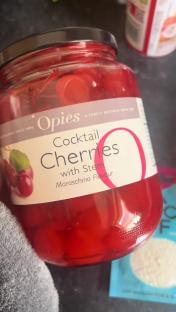 Jar of Opies Cocktail Cherries with Stem.
