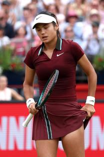 Emma Raducanu of Great Britain reacts during a tennis match.