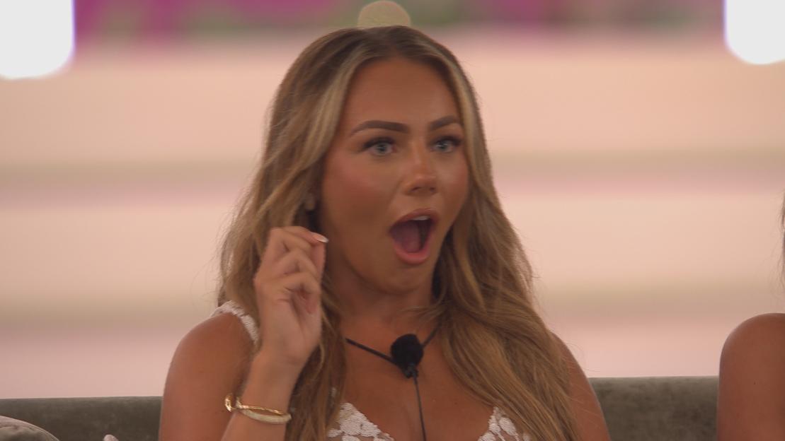 Meg from Love Island looking shocked.