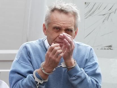 A man in handcuffs.