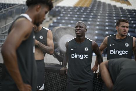 Chelsea F.C. players cooling down after training.