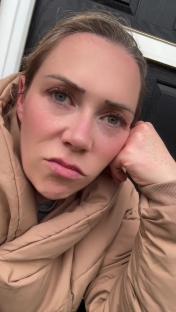 A woman with a worried expression.