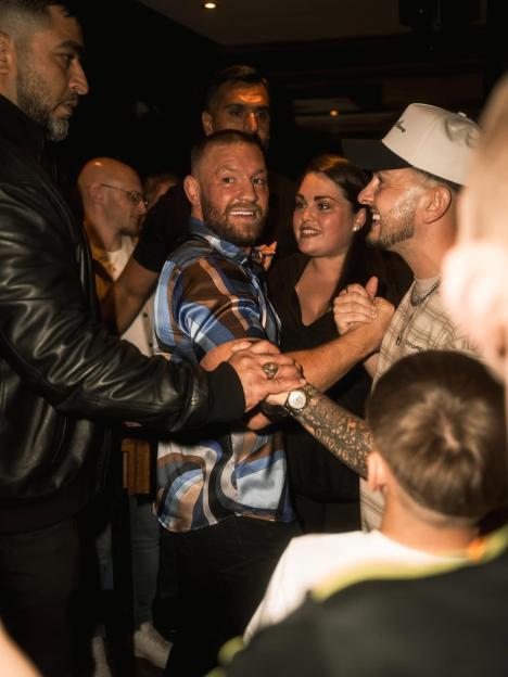 Conor McGregor with a group of people.