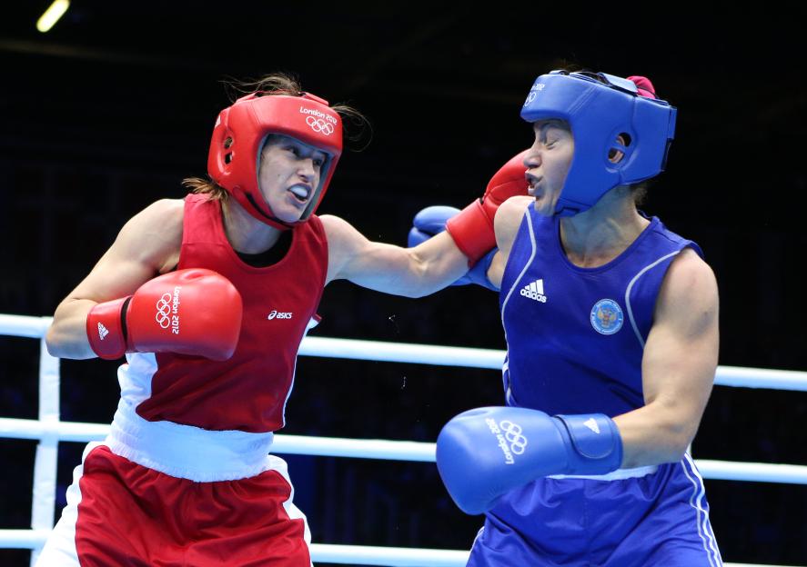 Katie Taylor (Ireland) boxing Sofya Ochigava (Russia) at the London 2012 Olympics.