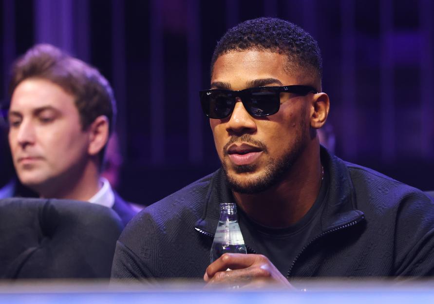 Anthony Joshua at a boxing match ringside.
