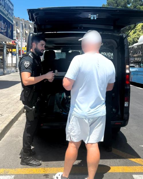 Police officer confiscating unsanitary cocktails from a tourist.