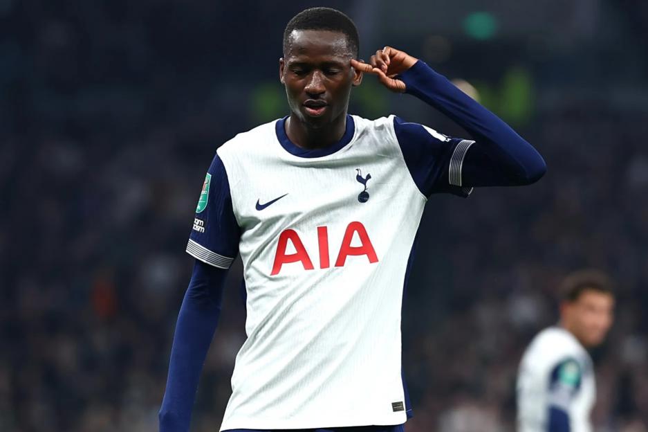 Pape Matar Sarr of Tottenham Hotspur celebrating a goal.