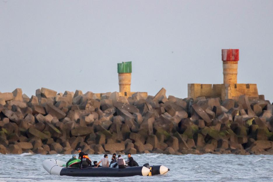 Migrants in a small boat off the coast of Gravelines, France.