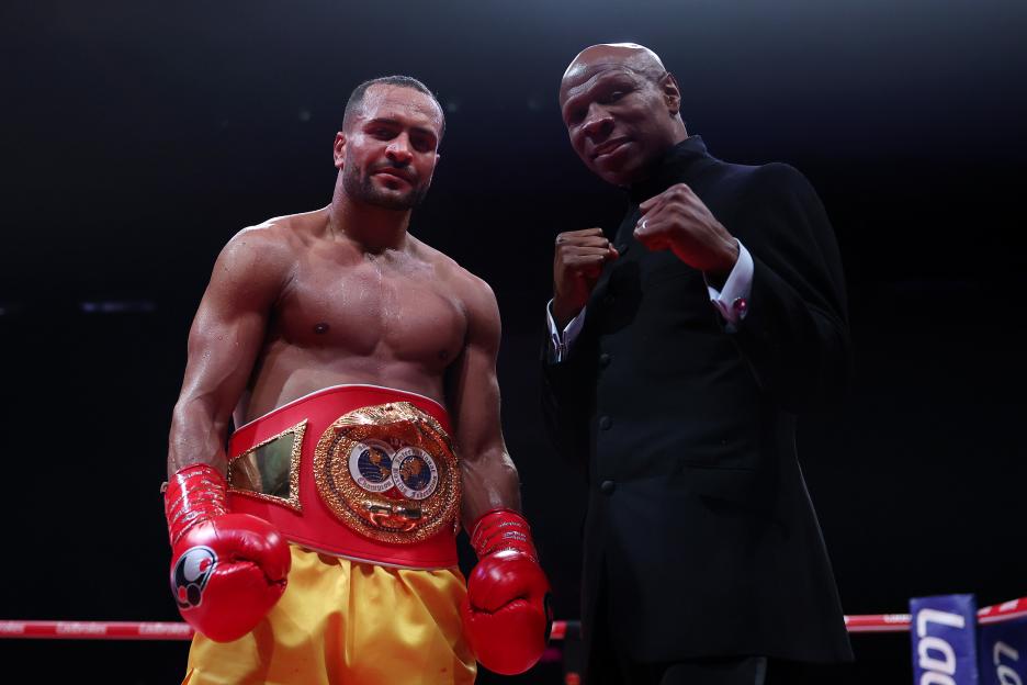 Harlem Eubank with his IBF Inter-Continental Welterweight Title belt, next to Chris Eubank.