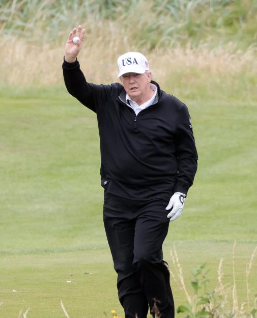 Donald Trump playing golf in Scotland.