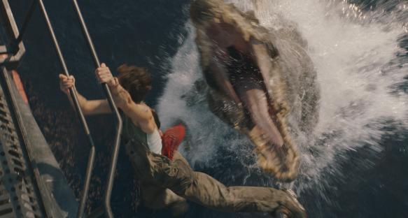 Philippine Velge in a scene from Jurassic World: Dominion, being attacked by a crocodile.