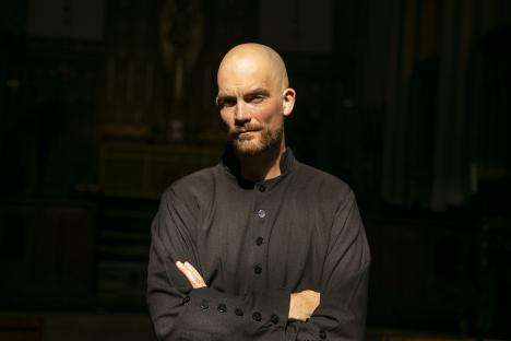 Portrait of Glyn Wise, a former Big Brother contestant, now training to be a priest.