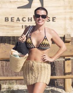 Coleen Rooney smiling at Beachouse Ibiza.