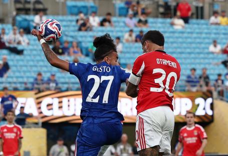Marc Cucurella of Chelsea FC kicking a soccer ball during a game.