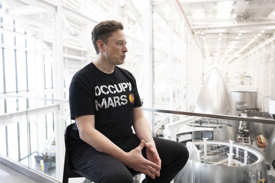 Elon Musk at SpaceX wearing an 