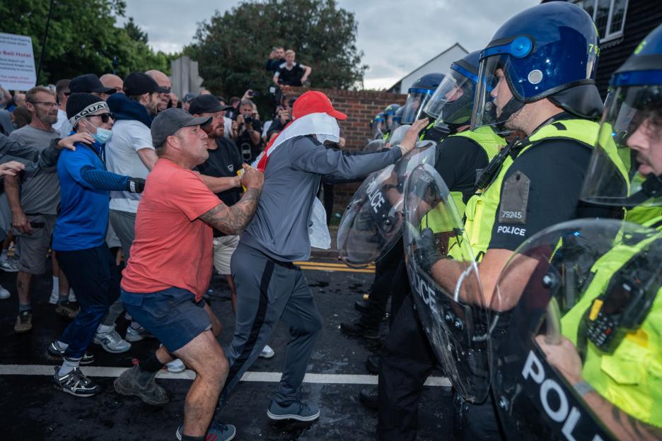 Anti-immigration protestors clashing with police.