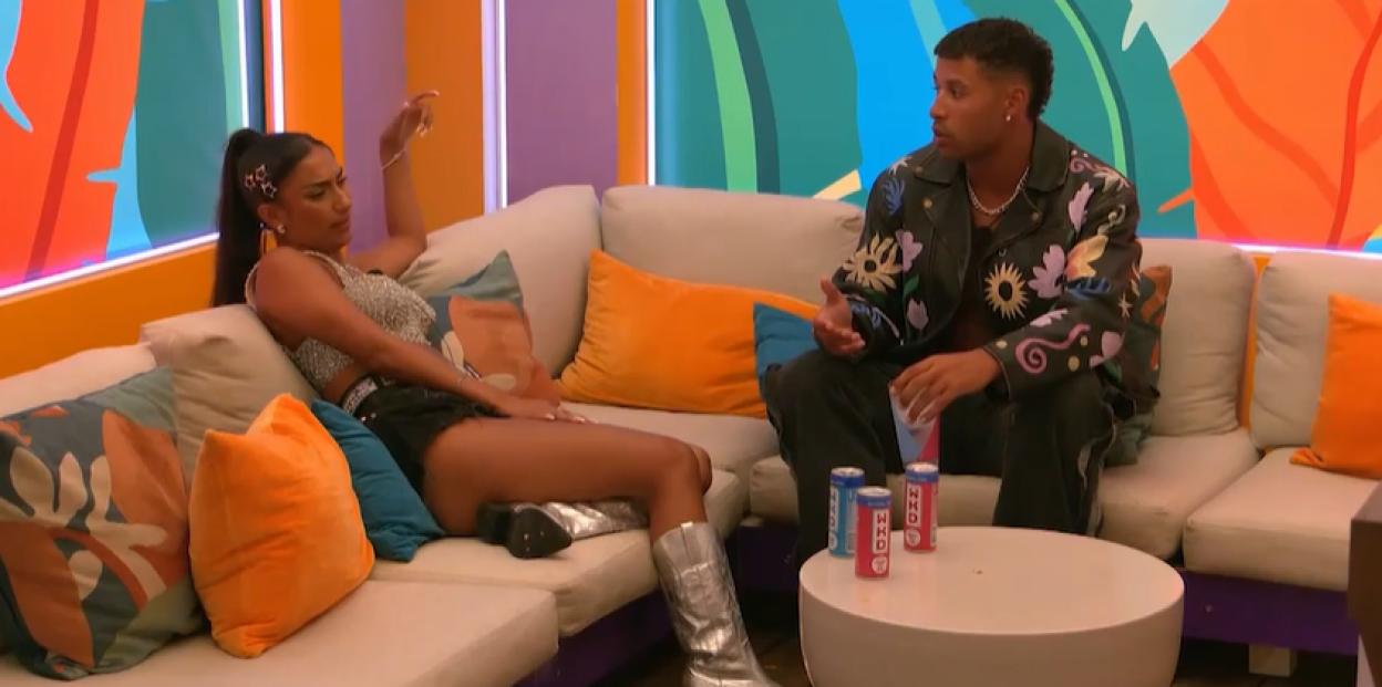Shakira from Love Island in conversation with another Islander.