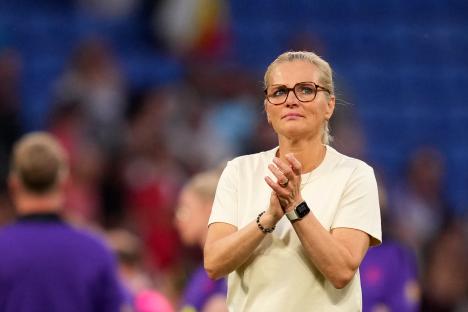 Sarina Wiegman, head coach of England, applauding.