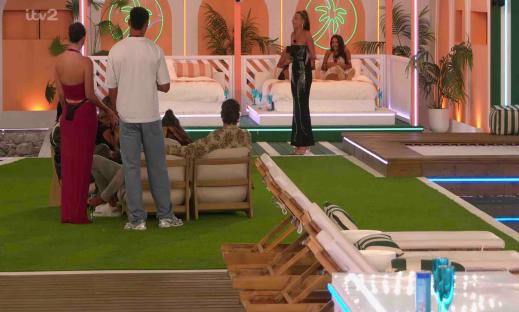 Screenshot from Love Island showing contestants gathered in the villa.