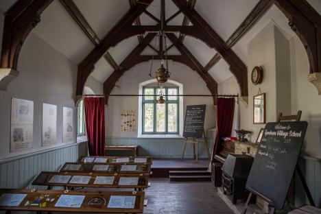 Interior of a deserted schoolhouse.