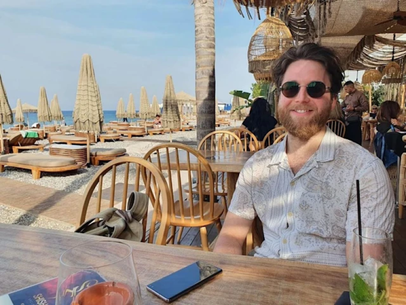 John Torode's son, Casper, enjoying a beachside cocktail.