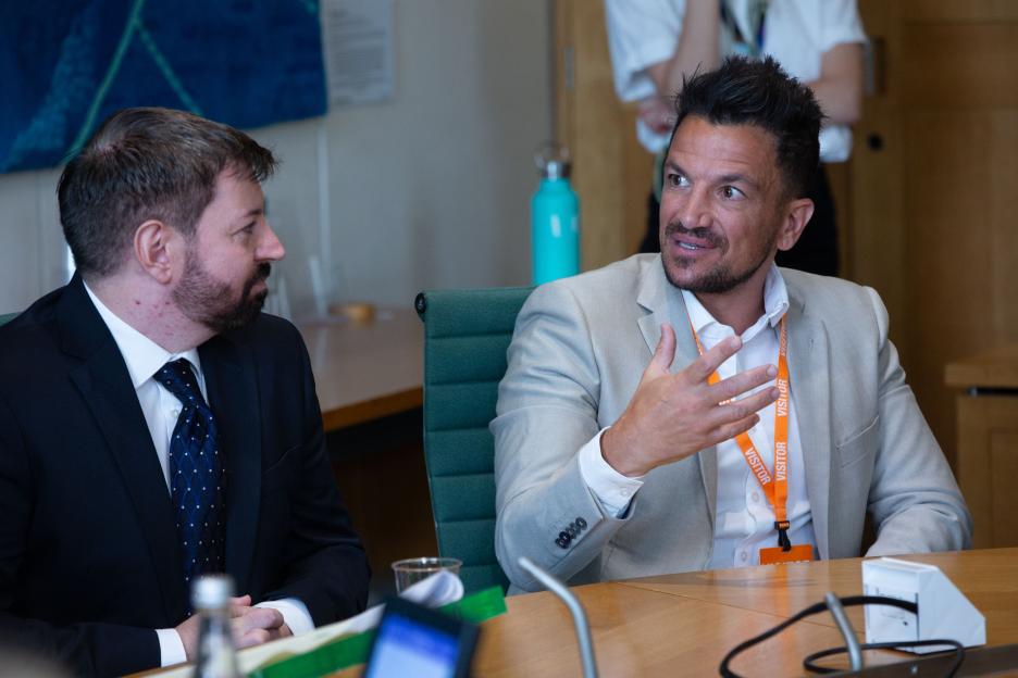 Peter Andre and another man at a parliamentary film screening.