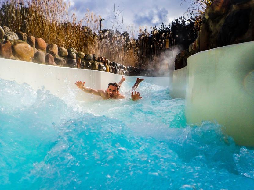 Man enjoying a water slide.