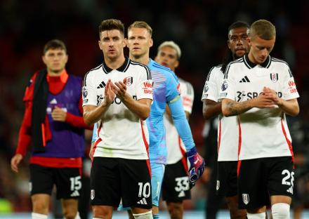 Fulham soccer players looking dejected after a match.
