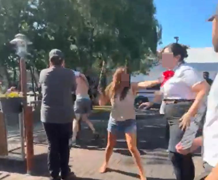 A brawl outside a McDonald's; a worker slapping a customer.