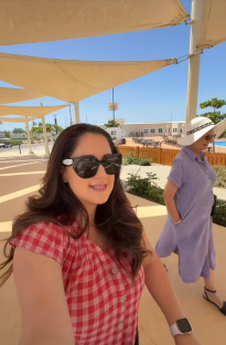 Two women walking outdoors.