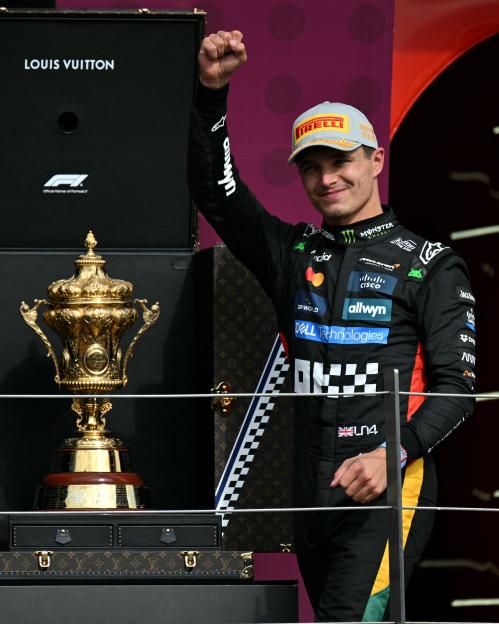 Lando Norris celebrating a Formula One victory.