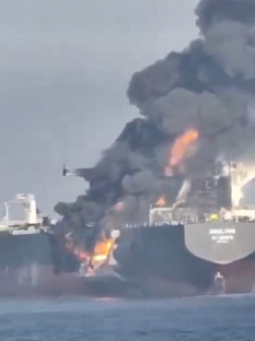 Oil tanker engulfed in flames.