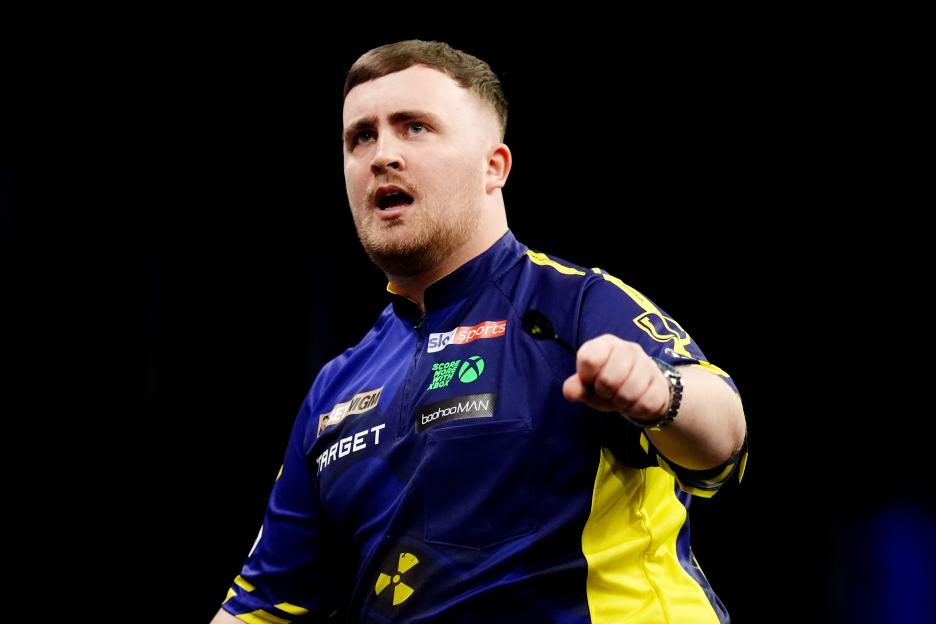 Photo of Luke Littler, a darts player.
