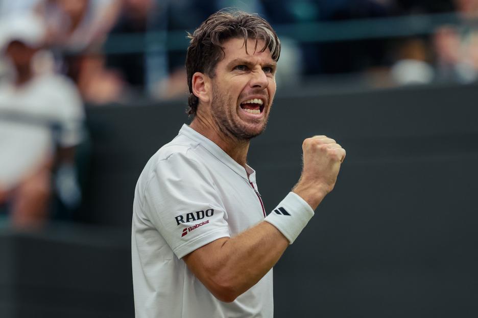 Cameron Norrie celebrating a point at Wimbledon.