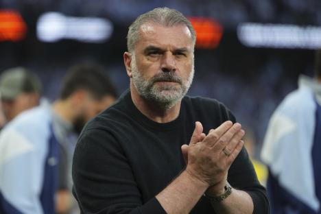 Ange Postecoglou, Tottenham's head coach, applauding.