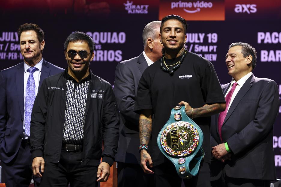 Manny Pacquiao and Mario Barrios at a press conference.