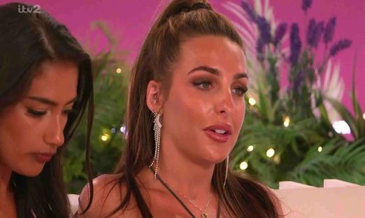 Screenshot of two women talking on Love Island.