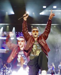 Justin Timberlake performing at a music festival.