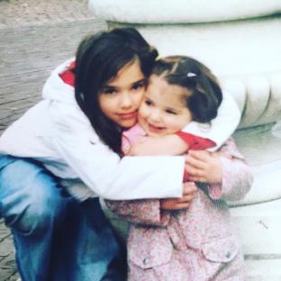 Dua Lipa hugging her sister Rina.