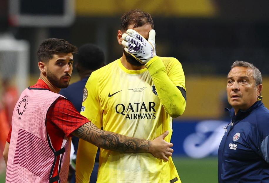 Gianluigi Donnarumma reacts during a soccer game.