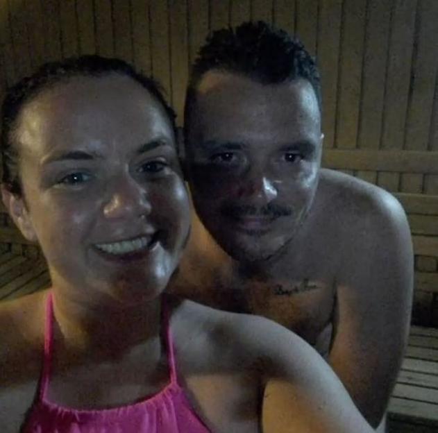 A couple in a sauna.